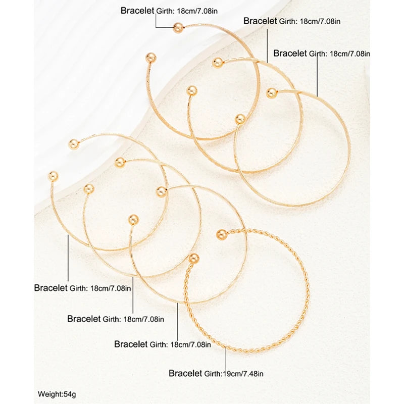 7 Piece Gold Open Bangle Set | Boho Heart Stacking Bracelets for Women