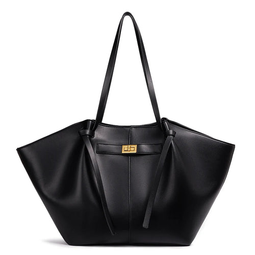 Black bat-shaped vegan leather shoulder bag - front view showing statement silhouette