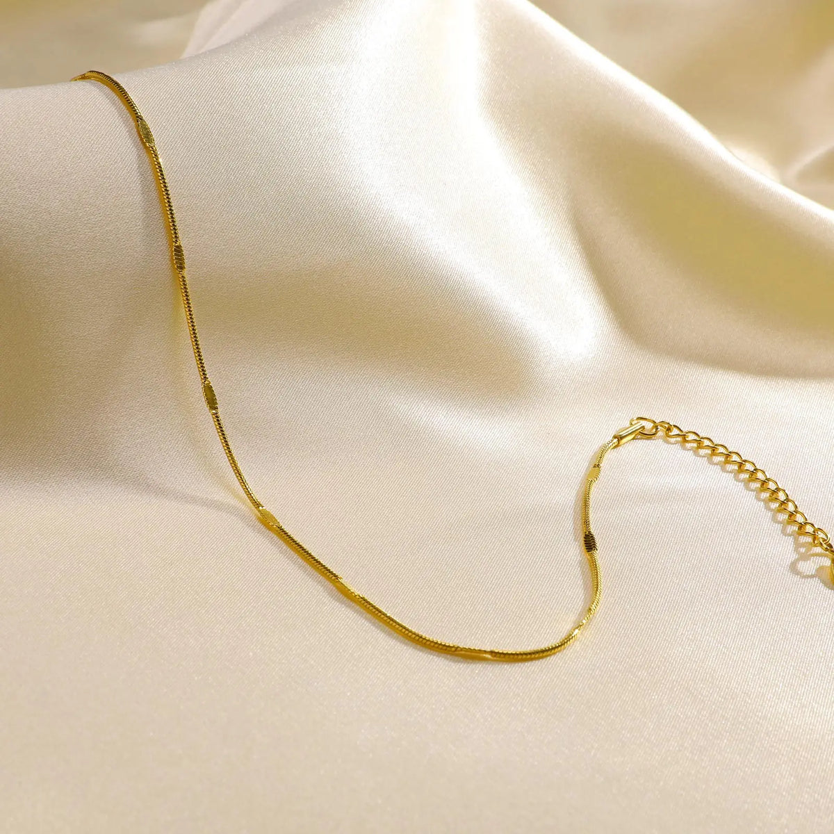 Beaded snake chain anklet, flat lay product shot, Varex HQ