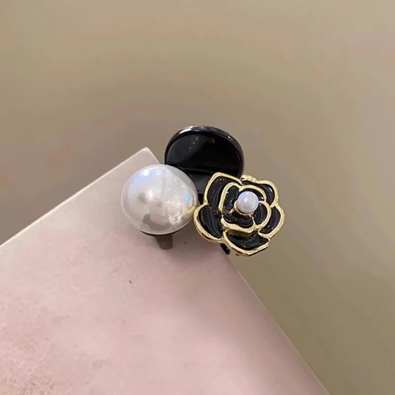 Camellia Pearl Hair Claw Clip in acrylic with faux pearl accents, side profile - Varex HQ