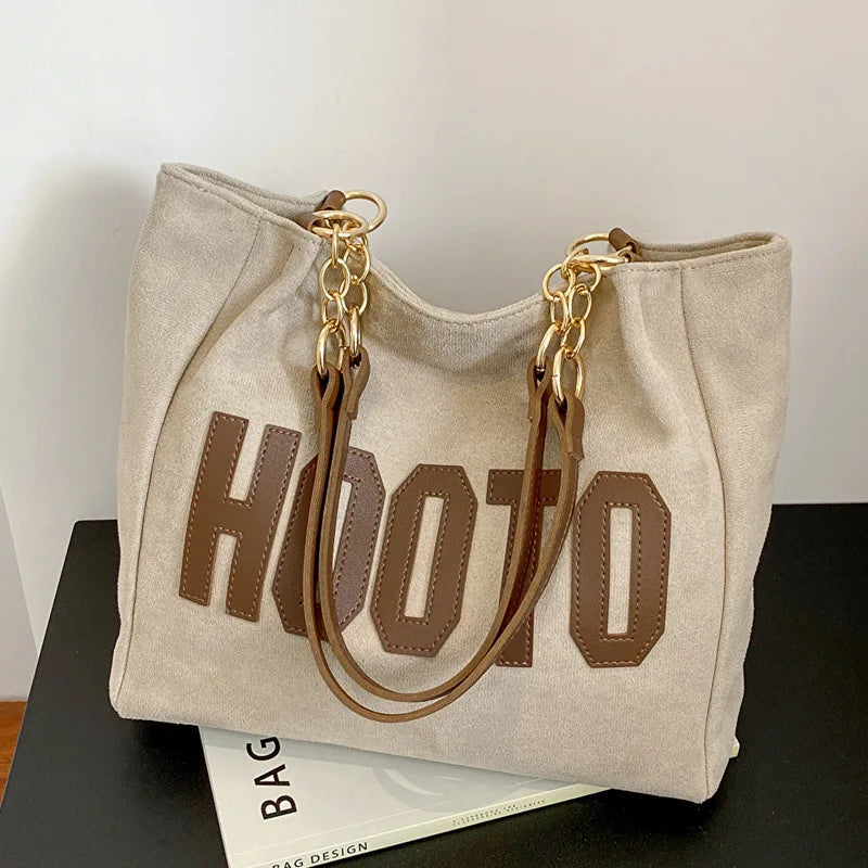 Black canvas campus tote bag - interior view showing spacious main compartment