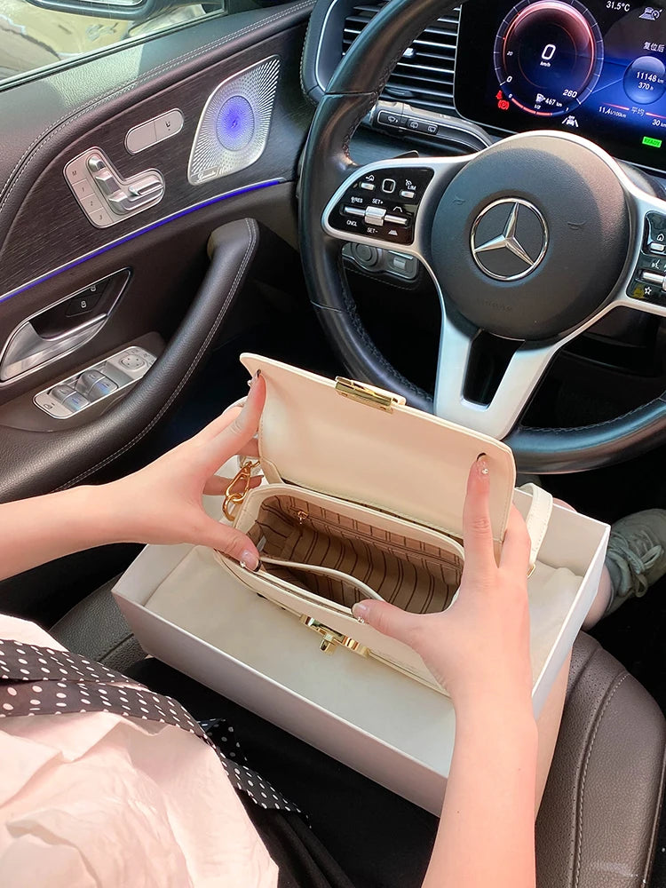 Beige vegan leather shoulder bag - interior view showing magnetic closure