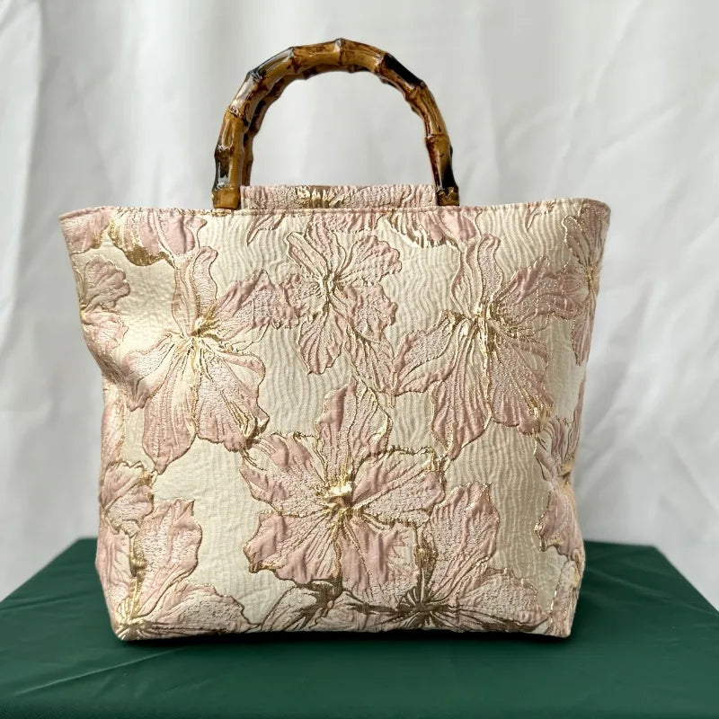 Pink embroidered canvas tote bag - close-up of embroidery stitching detail