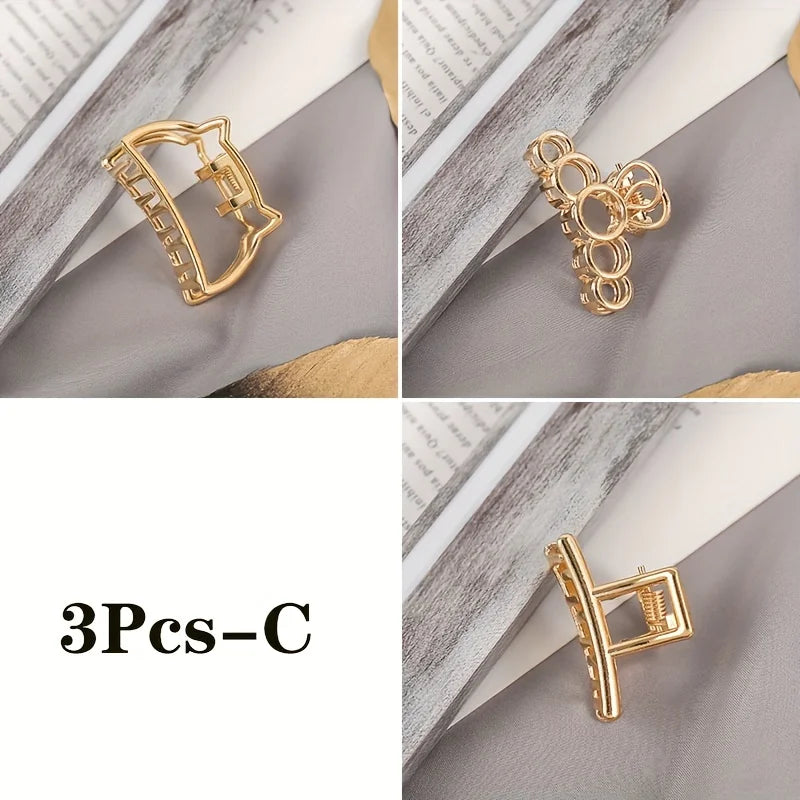 Geometric Hollow Hair Claw Clip in gold-tone metal finish, side profile - Varex HQ