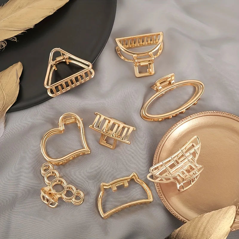 Geometric Hollow Hair Claw Clip in gold-tone metal finish, side profile - Varex HQ