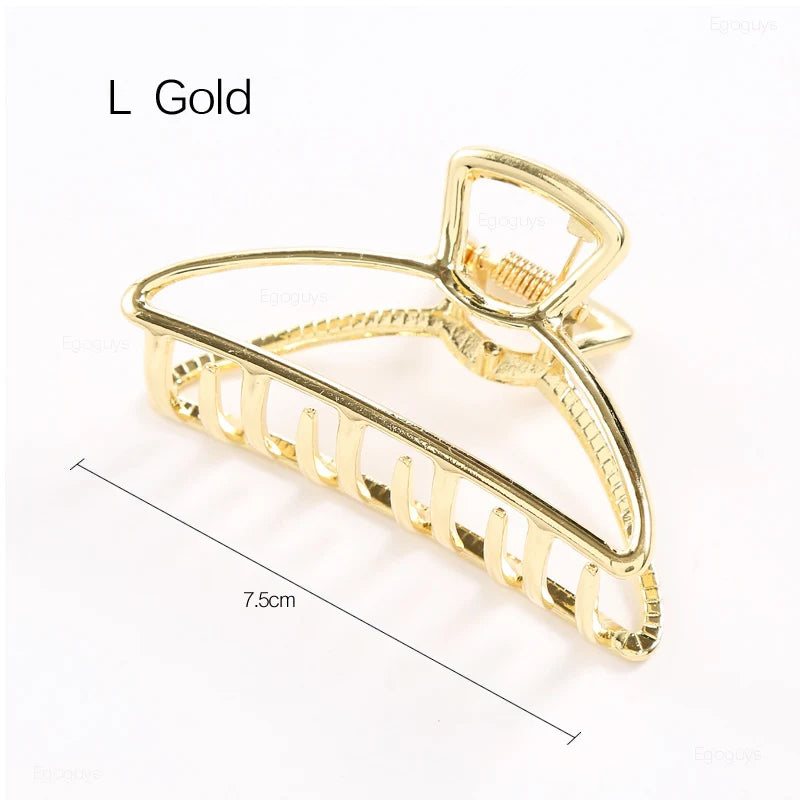 Geometric Metal Hair Claw Clip in silver, black and gold-tone metal finish, styling angle - Varex HQ