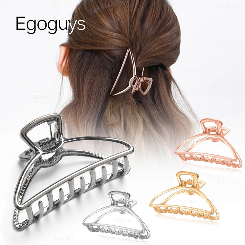 Geometric Metal Hair Claw Clip in silver, black and gold-tone metal finish, close-up detail - Varex HQ