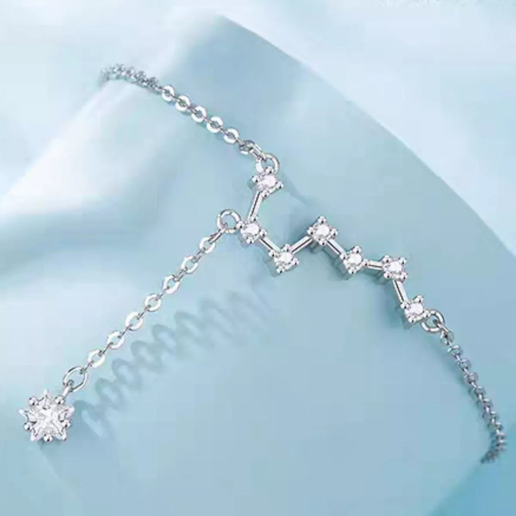 Close-up of silver-tone zircon constellation chain link, Varex HQ