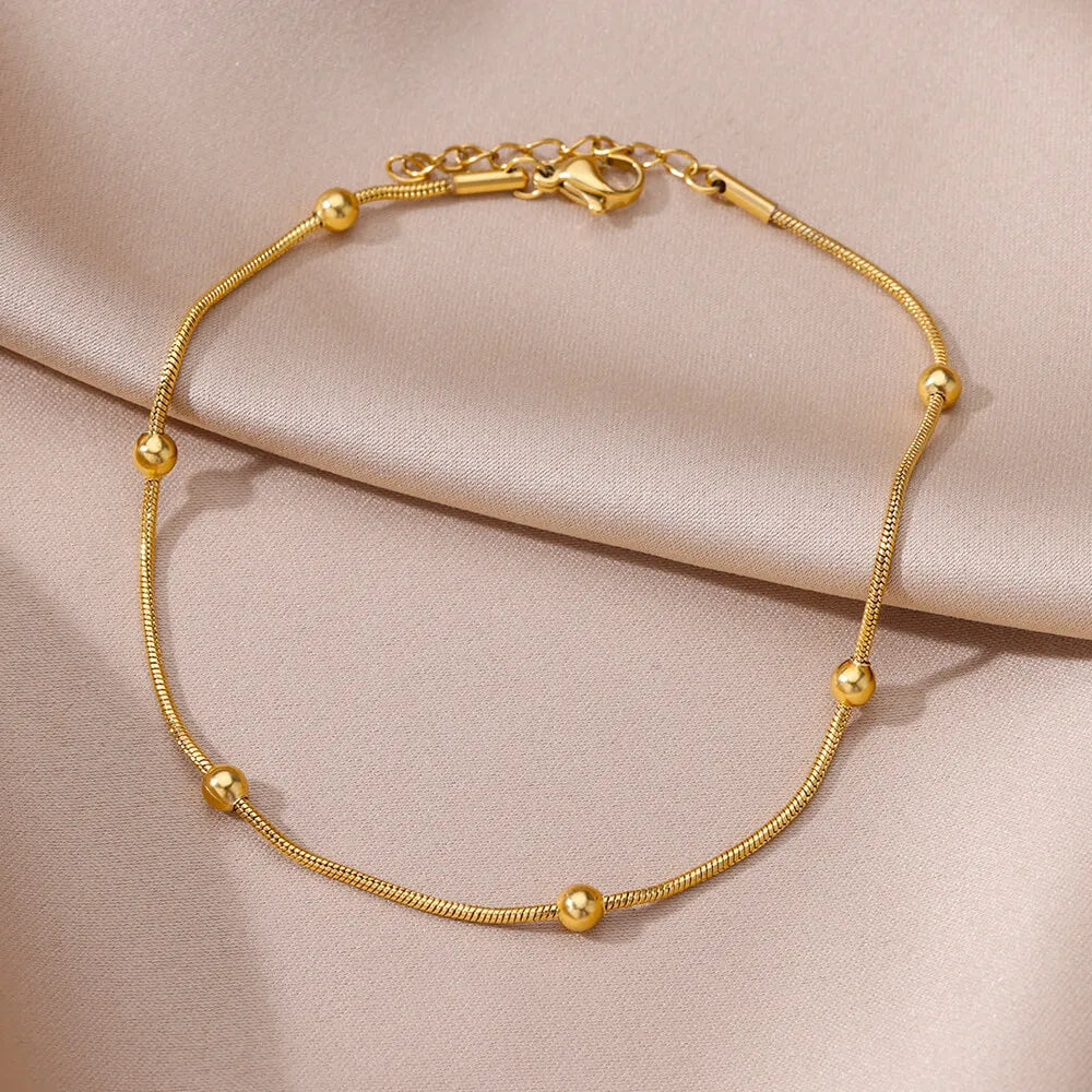 Stainless steel gold-tone beaded anklet close-up, Varex HQ