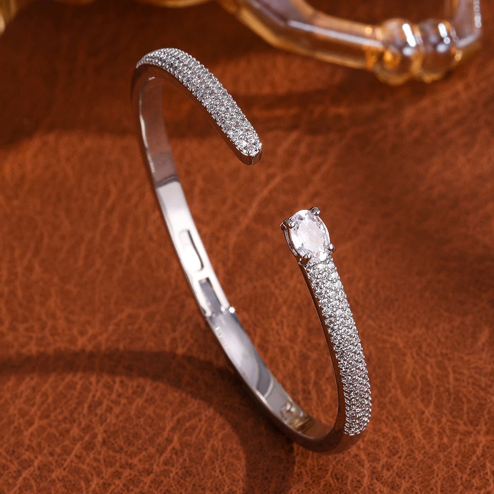 Gold geometric open cuff bangle with teardrop cubic zirconia, view 8 - Varex HQ