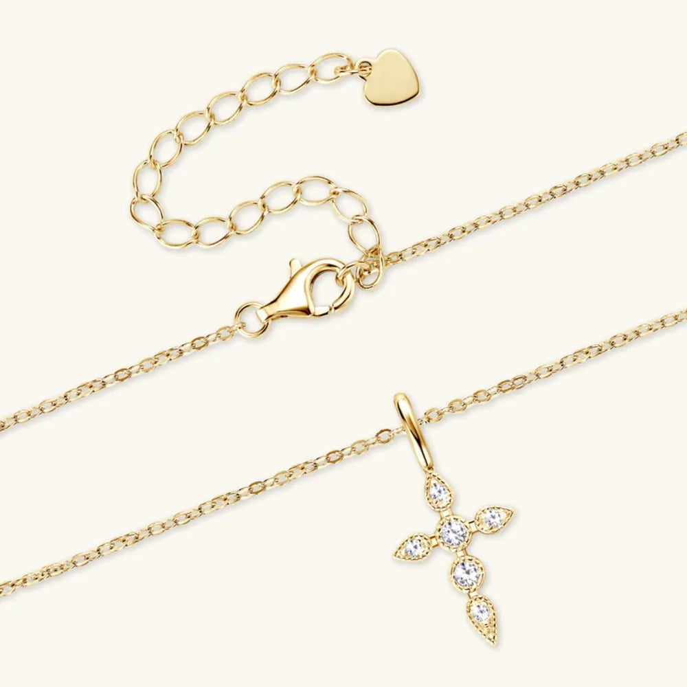 Extended 18K gold-plated chain layout with cross pendant.