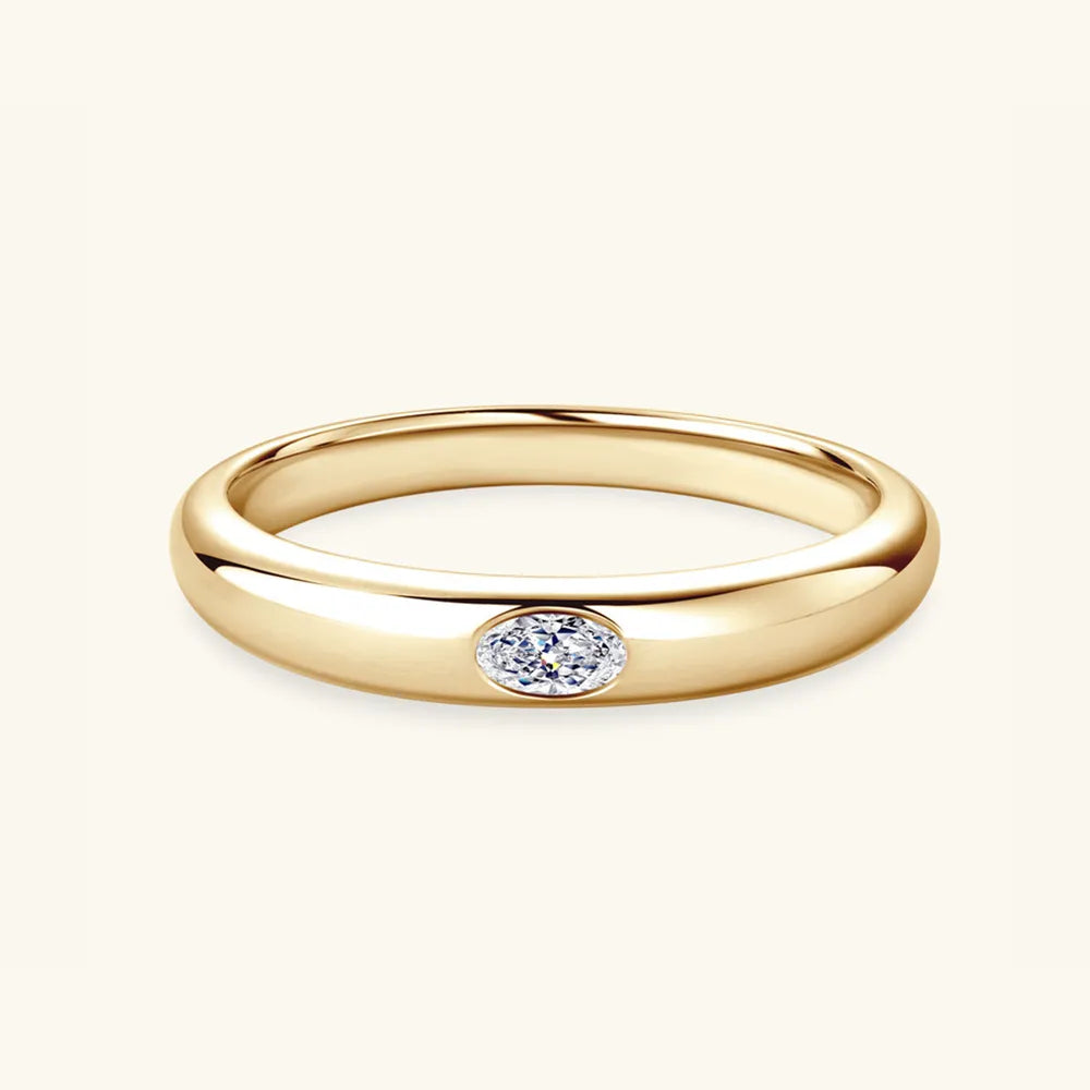 Front view of 18K gold-plated sterling silver ring with inlaid moissanite stone.