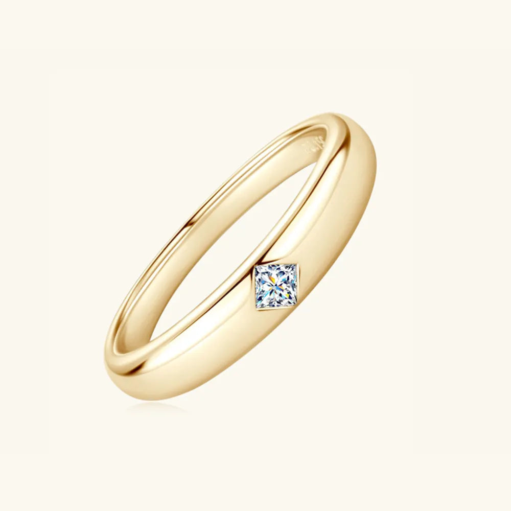 Perspective view of gold-plated sterling silver moissanite band ring.