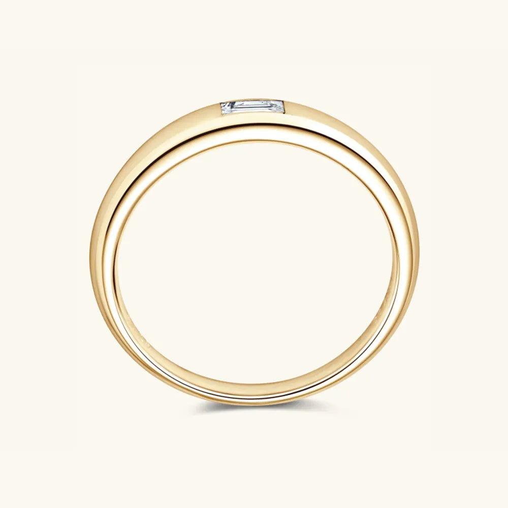 Top view of gold-plated silver ring with inlaid moissanite gemstone.