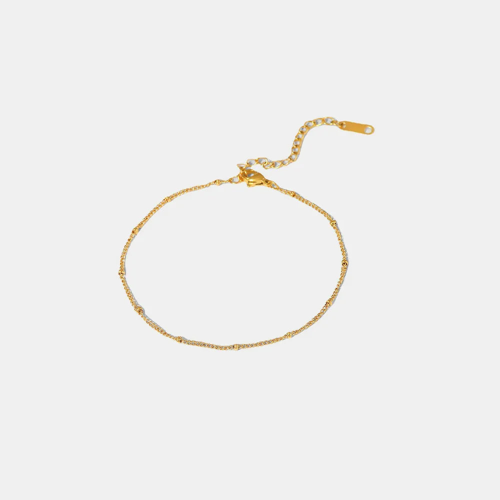 Gold-plated bead anklet displayed flat on clean white background