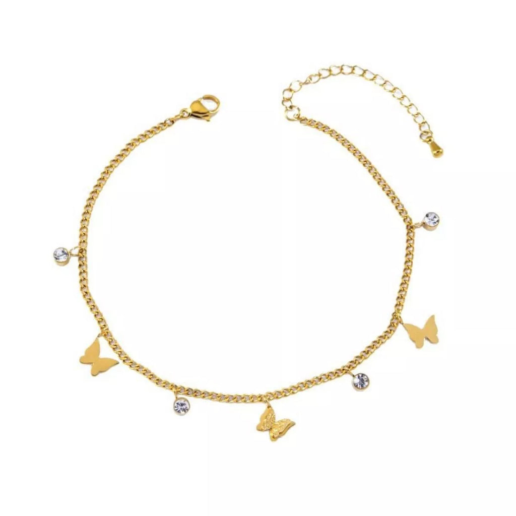 Gold-plated butterfly charm anklet on isolated white background