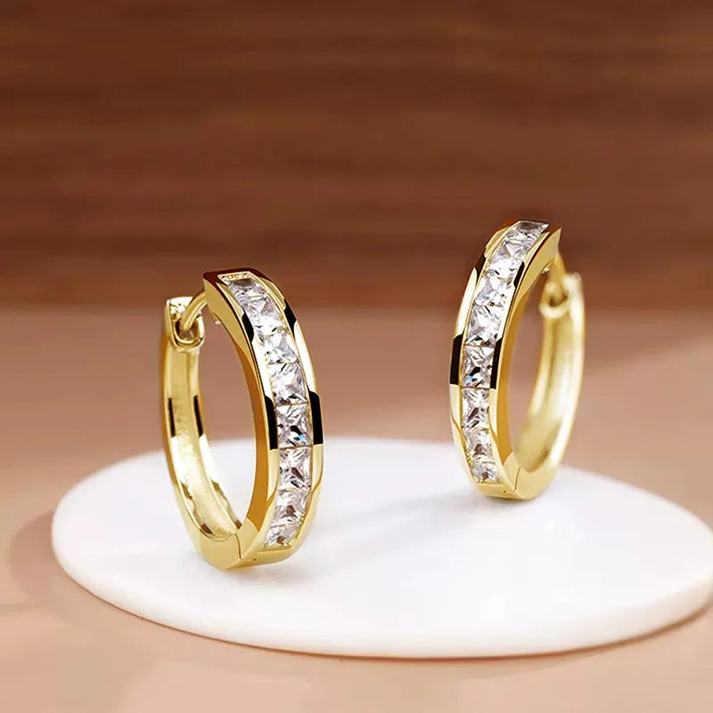 Gold-plated stainless steel round hoop earrings with cubic zirconia, front view pair - Varex HQ