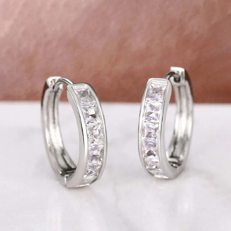 Gold-plated stainless steel round hoop earrings with cubic zirconia, styling angle 4 - Varex HQ