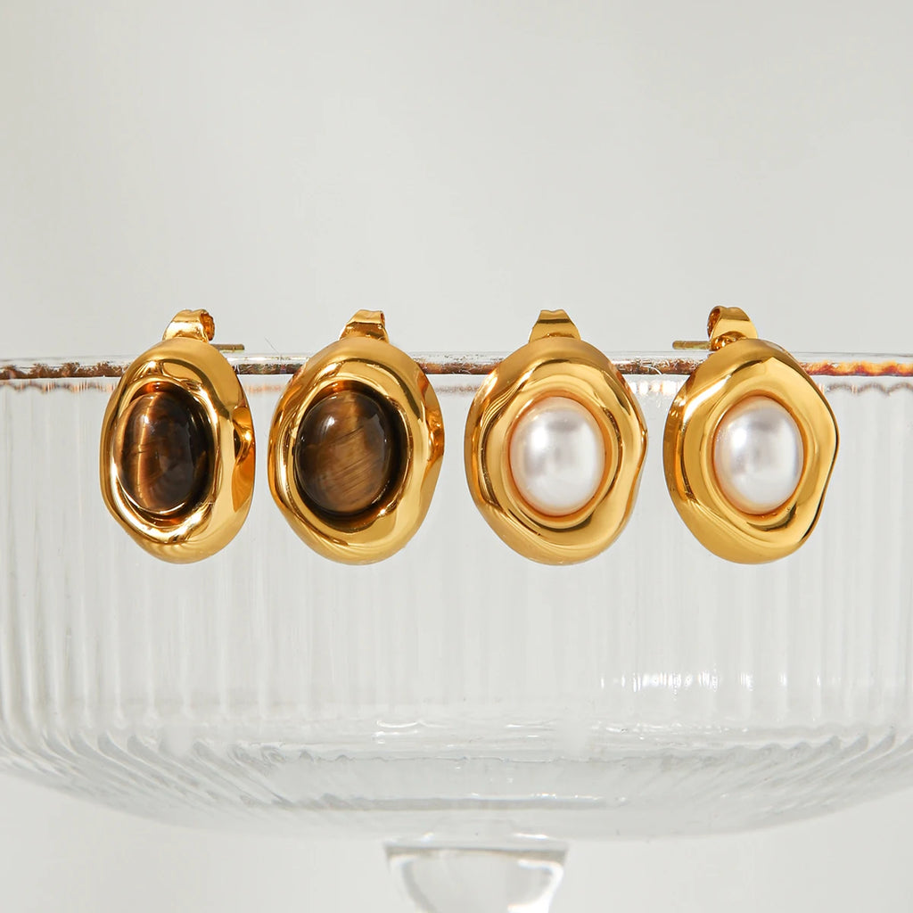Gold-plated stud earrings with stone and faux-pearl accent, styling angle 2 - Varex HQ