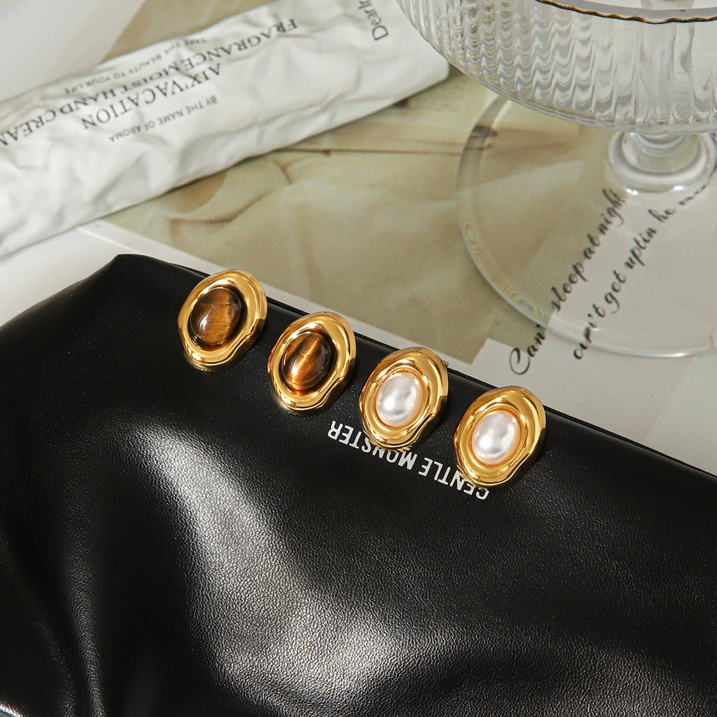 Gold-plated stud earrings with stone and faux-pearl accent, styling angle 3 - Varex HQ