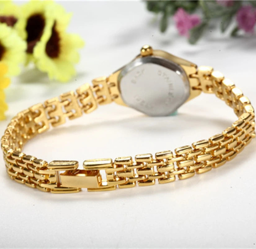 Gold-tone mesh bracelet watch, clasp and link detail