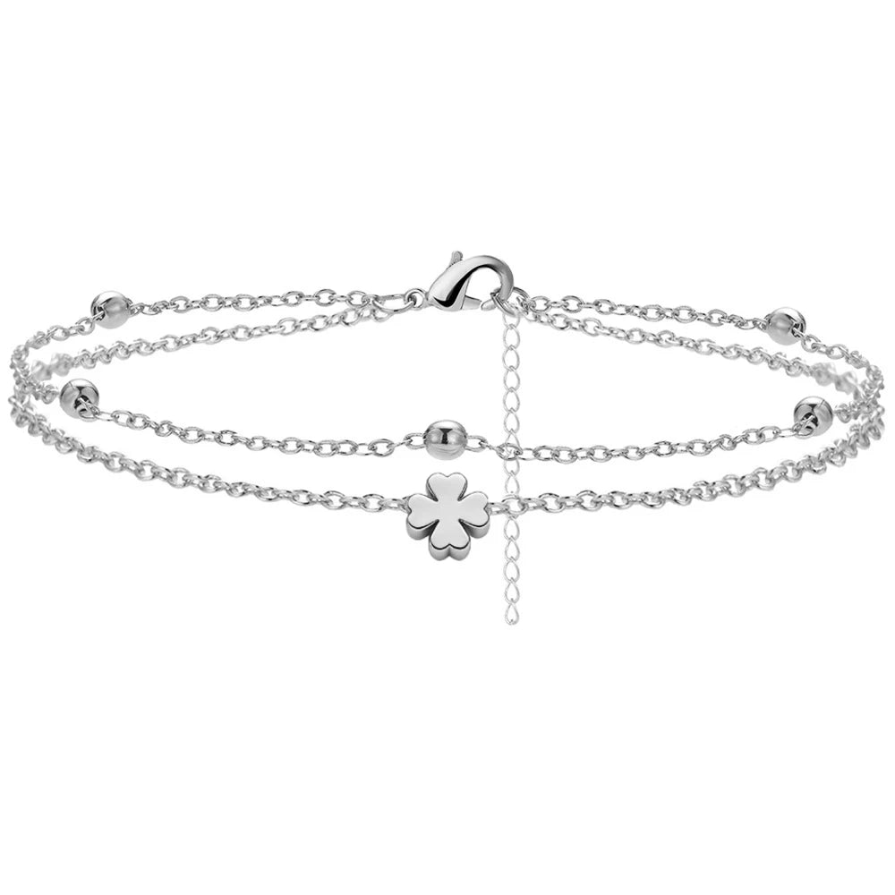 Gold-tone heart charm layered anklet, close-up detail, Varex HQ