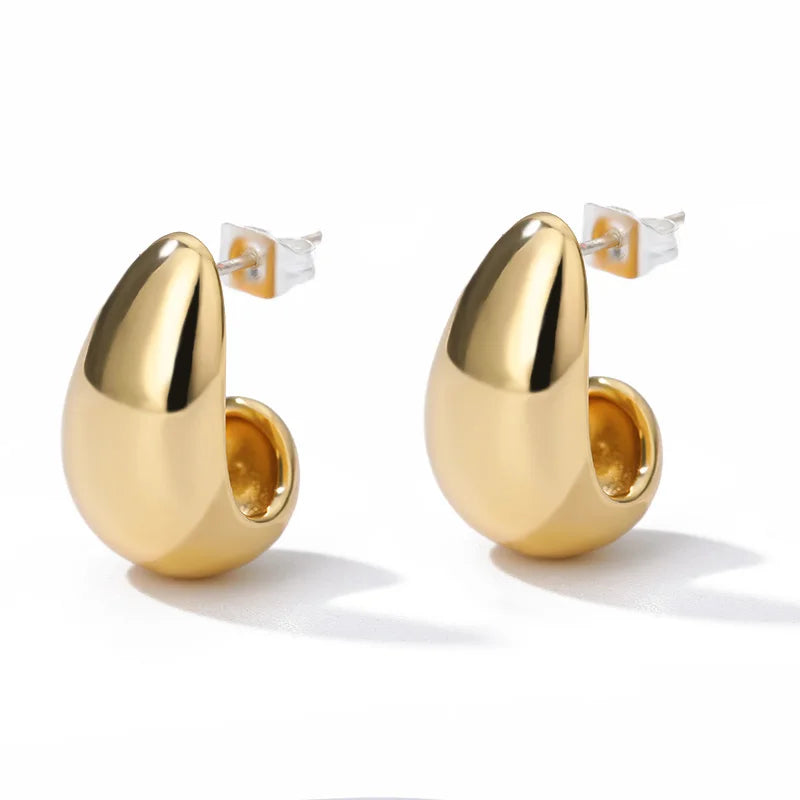 Heart hoop earrings in stainless steel styled on model, lifestyle shot - Varex HQ