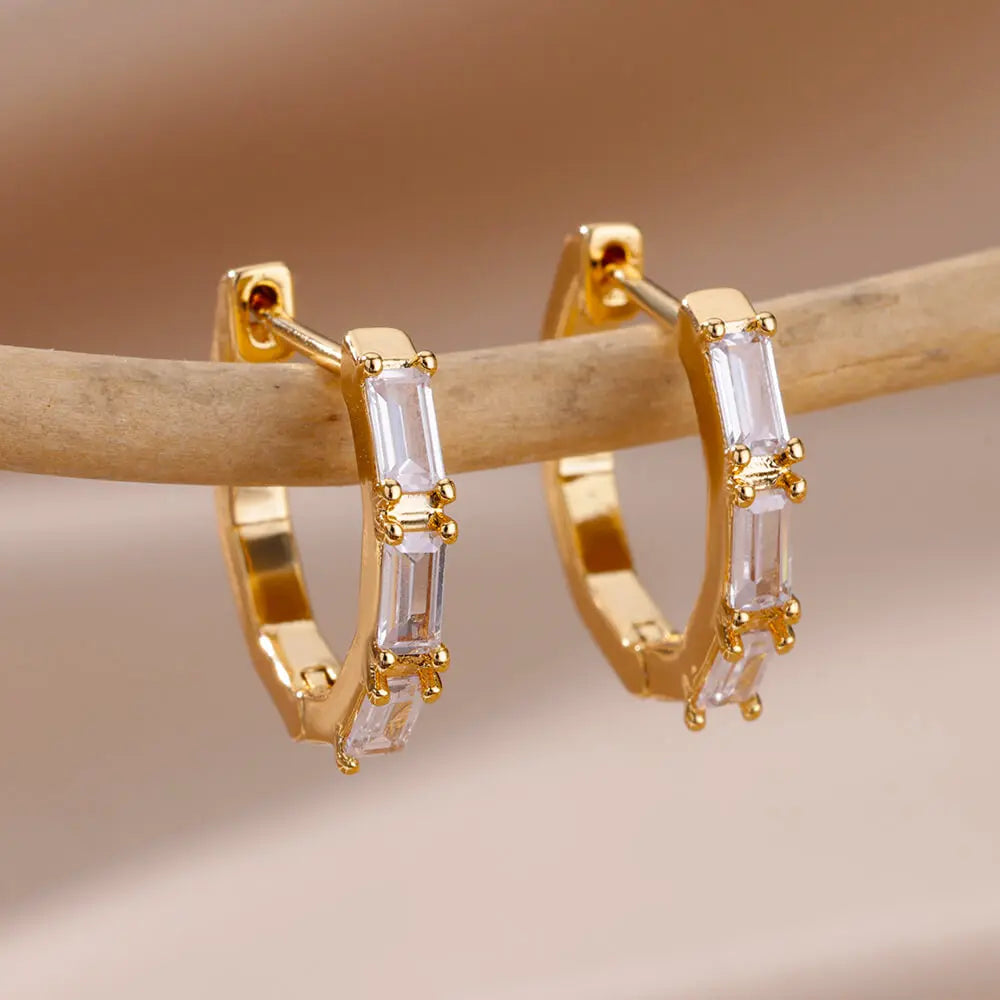 Heart hoop earrings in stainless steel with cubic zirconia, gold-tone baguette crystal hoop style - Varex HQ