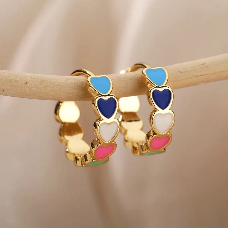 Heart hoop earrings in stainless steel with cubic zirconia, gold-tone rainbow heart hoop style - Varex HQ