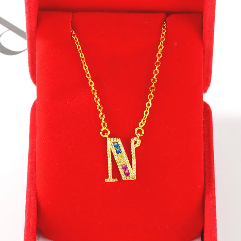Personalized gold-plated initial pendant necklace with cubic zirconia - texture close-up - Varex HQ