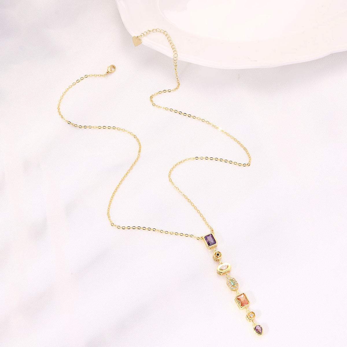 Long gold-plated pendant necklace with colored zircon drop - styling angle - Varex HQ