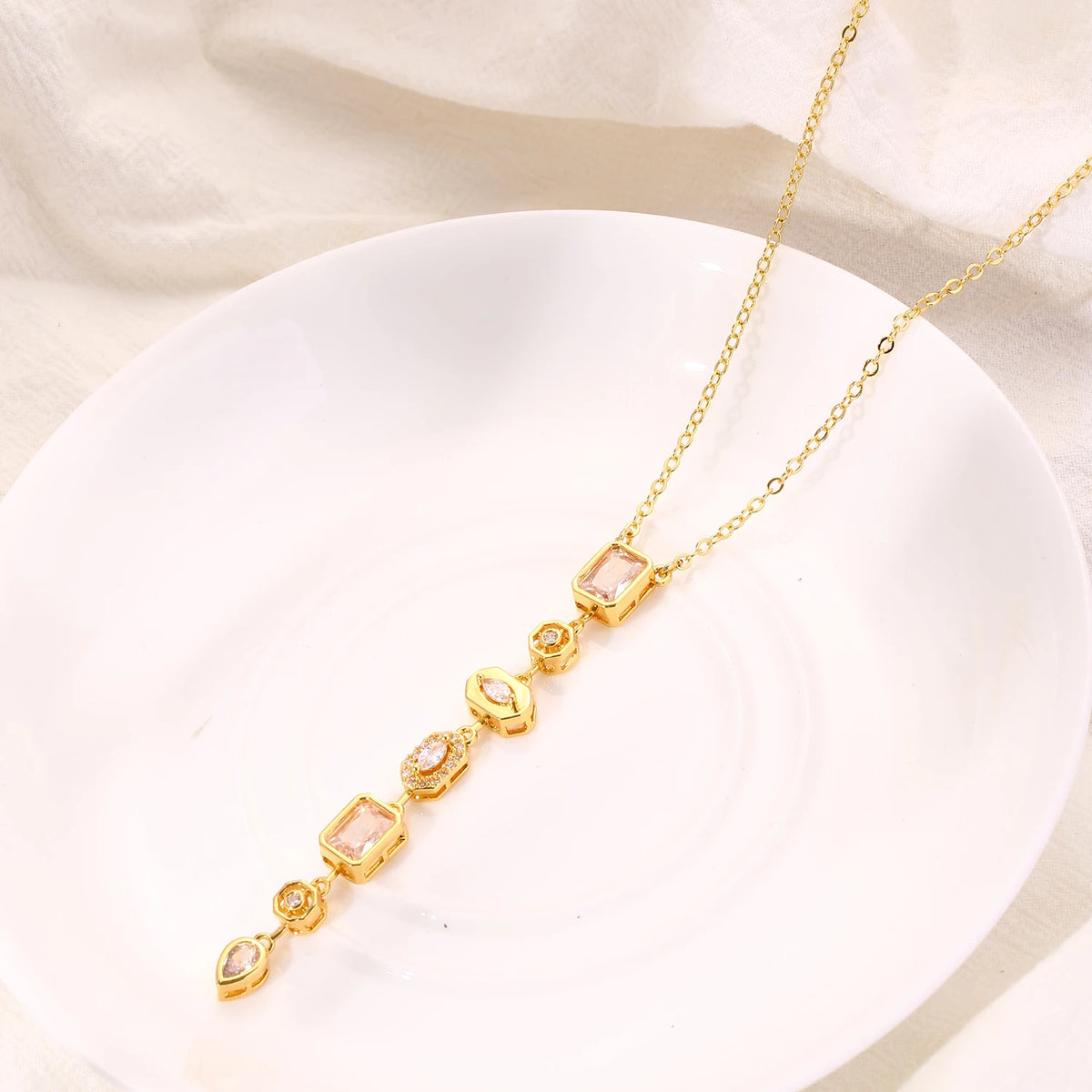 Long gold-plated pendant necklace with colored zircon drop - additional angle - Varex HQ
