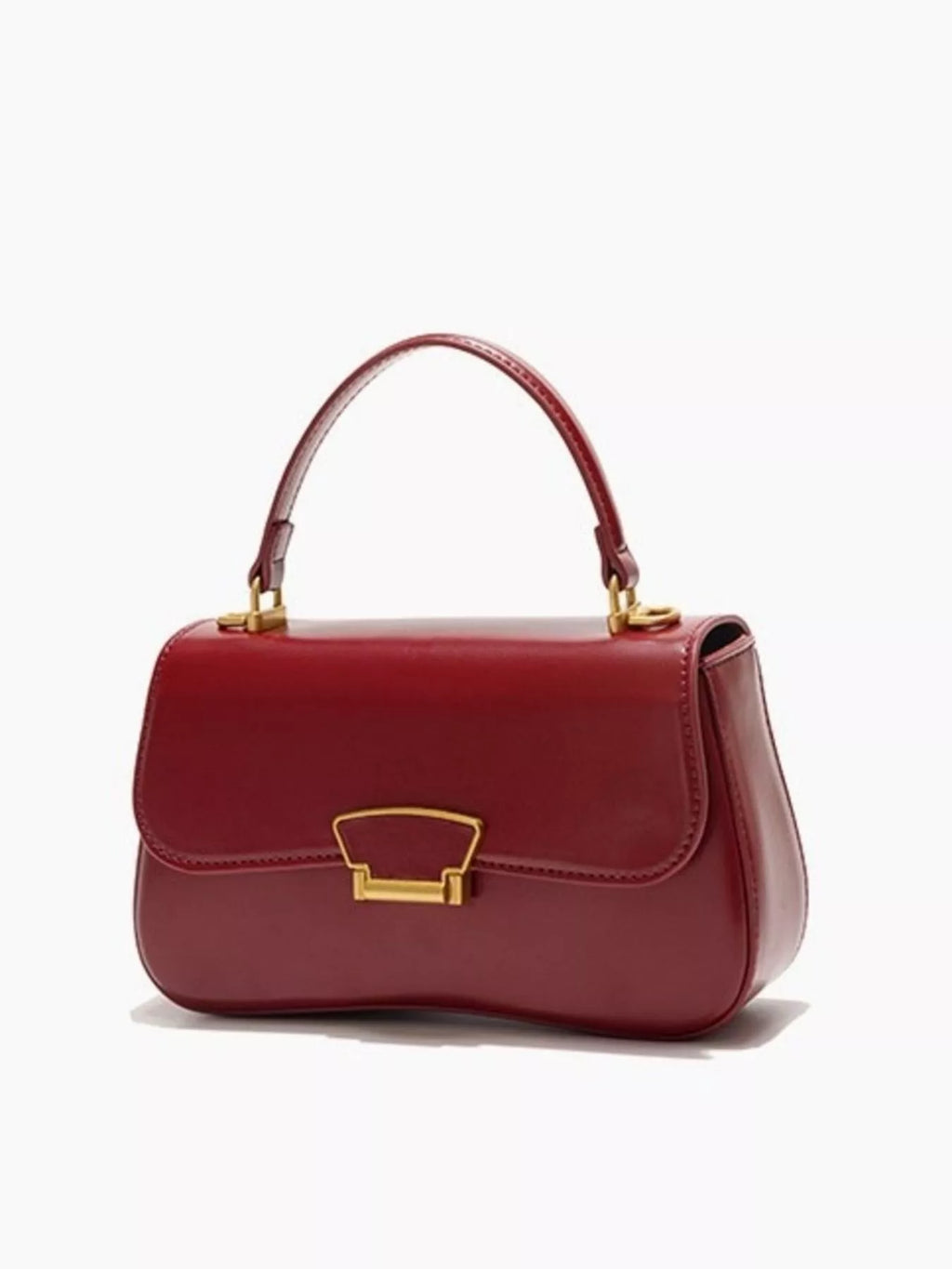 Mini vegan leather crossbody bag in red - front view showing turn-lock clasp