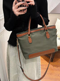 Olive green two-tone vegan leather tote bag - front view with contrast tan trim