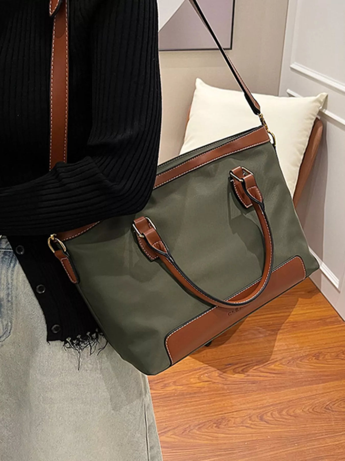 Olive green two-tone vegan leather tote bag - lifestyle shot worn on the shoulder