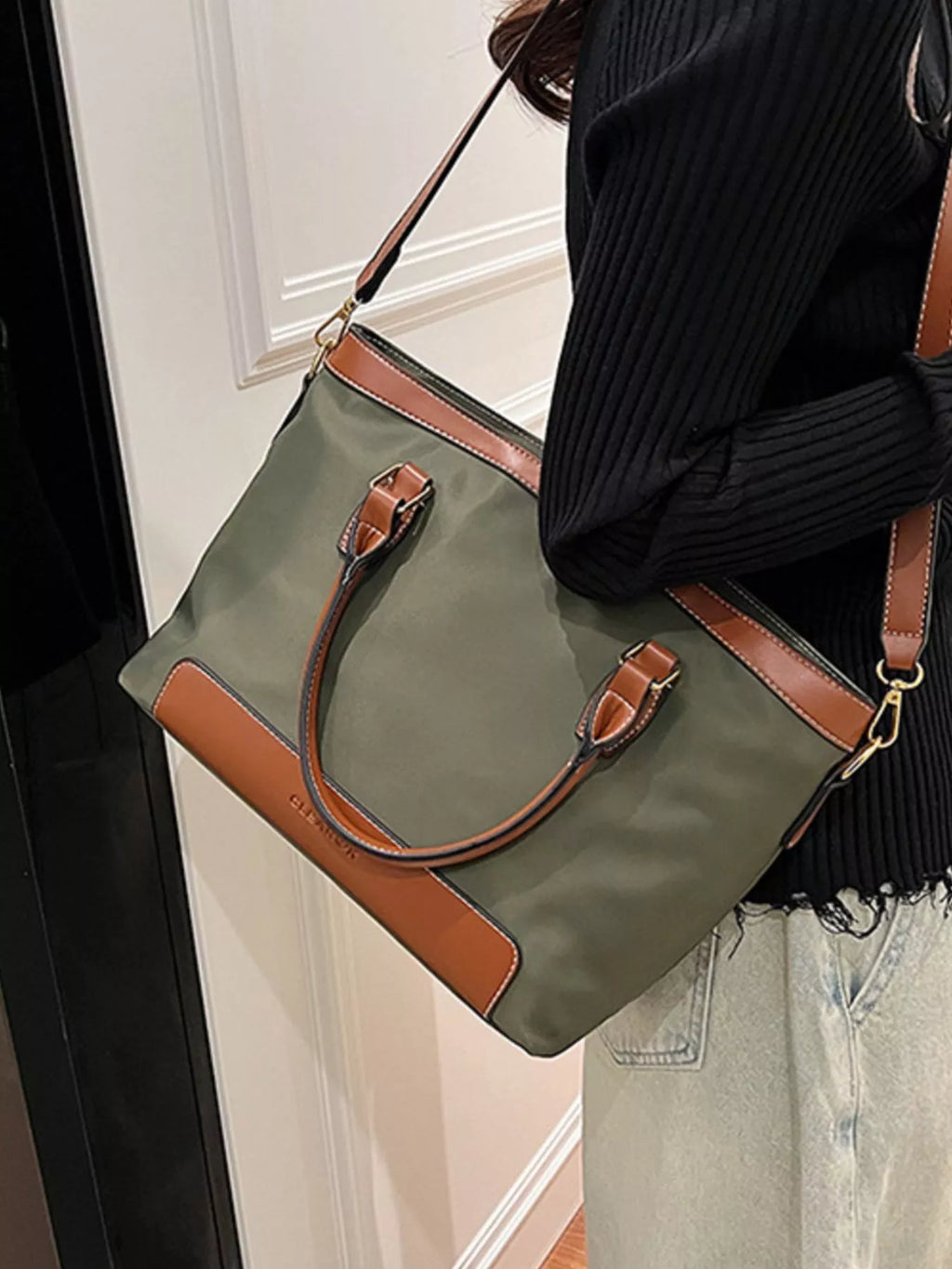 Olive green two-tone vegan leather tote bag - side angle showing structured silhouette
