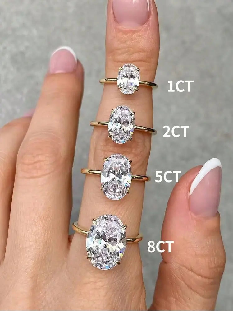Oval-cut zircon statement ring in gold-tone finish