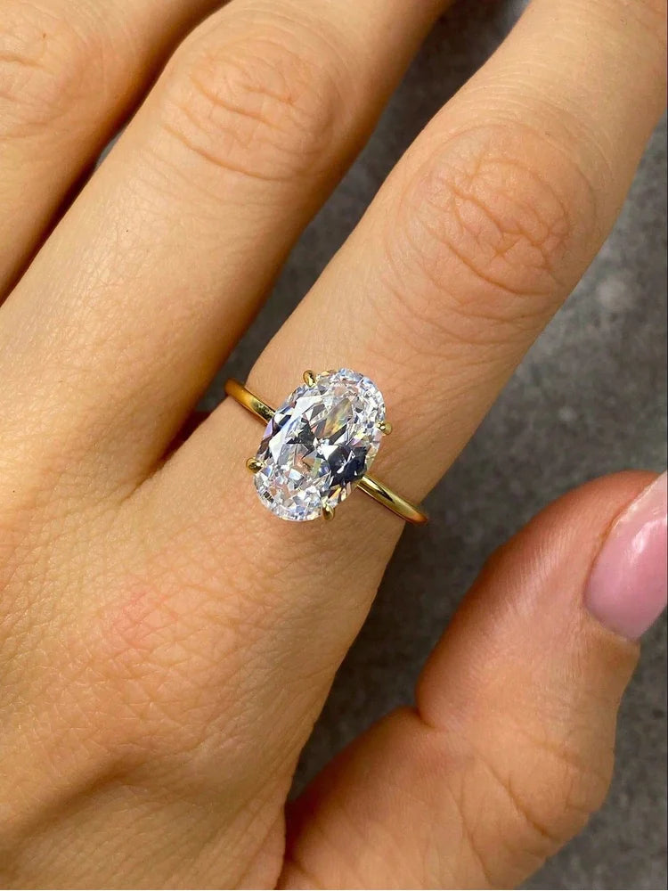 Oval-cut zircon statement ring in silver-tone finish, front view