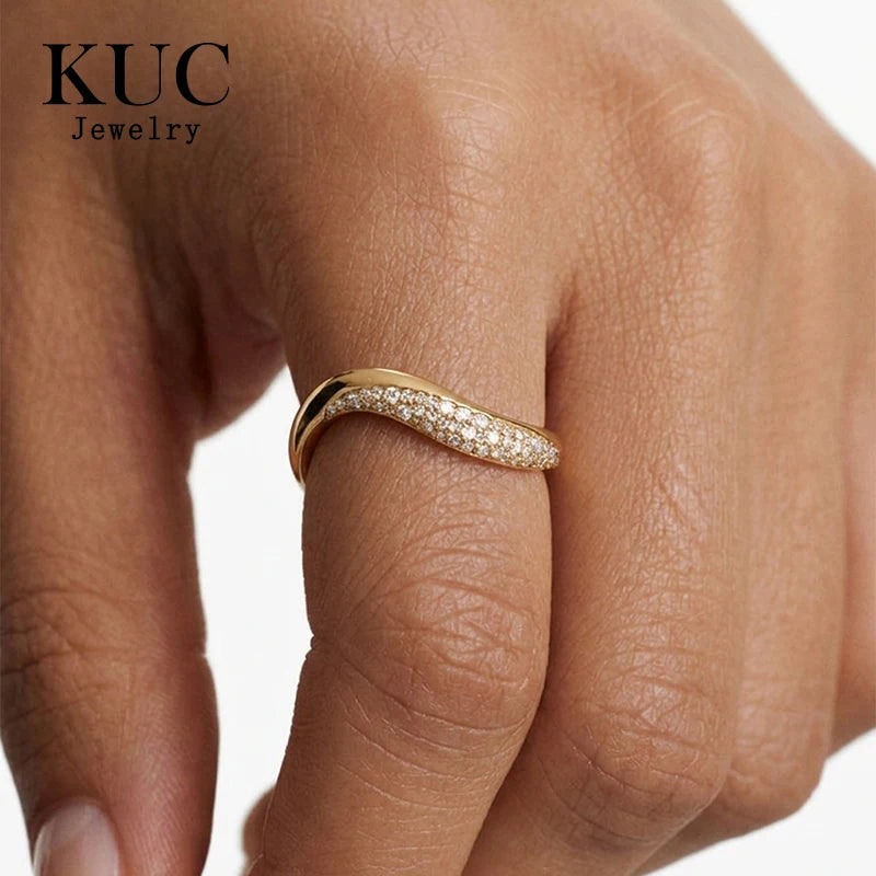 Side profile of sculptural wave dome ring