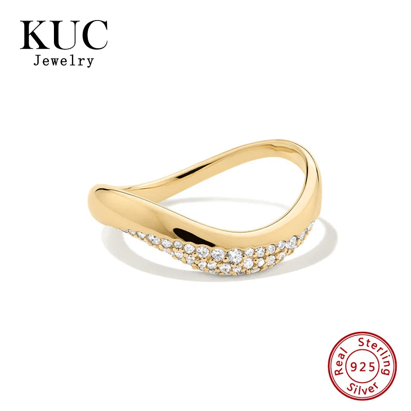 Close-up of pave-set zircon stones on dome ring