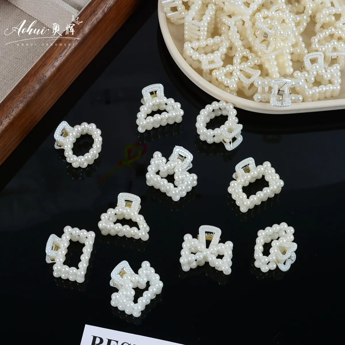 Pearl Hair Claw Clip Set in assorted pearl shapes, flat lay - Varex HQ