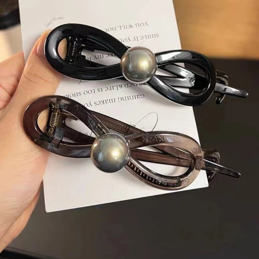 Pearl Mini Hair Claw Clip in acrylic with faux pearl accents, front view - Varex HQ