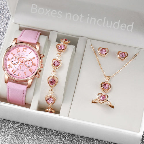 5-piece pink quartz watch and crystal heart jewellery set laid out