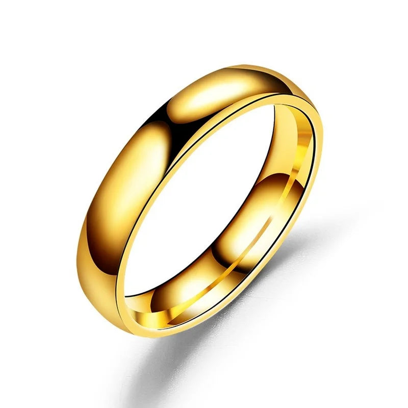 Stainless steel couple band ring worn on finger close-up