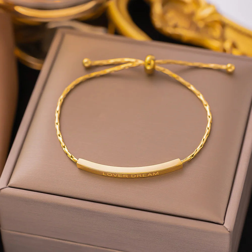 Gold-tone and silver-tone pull-back bangle shown together - Varex HQ