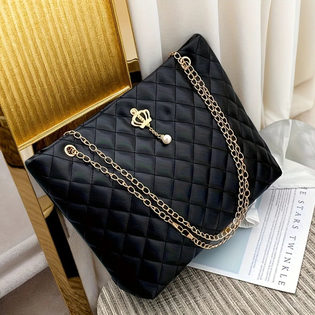 Pink quilted vegan leather shopper tote - front view showing diamond-quilted texture and chain strap