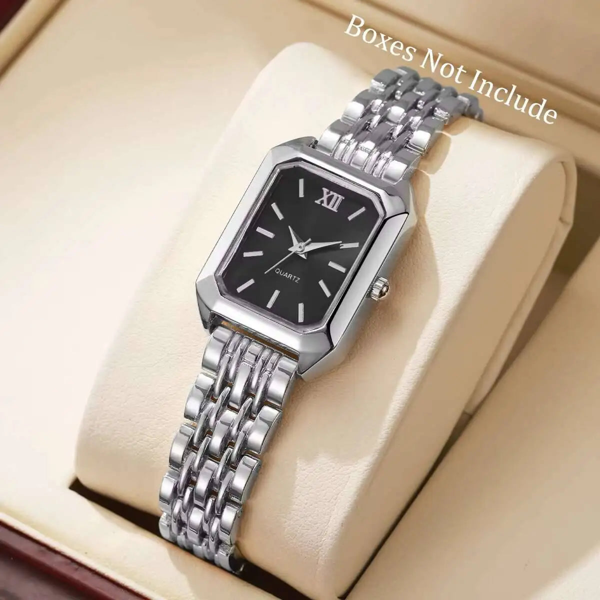 Rectangular gold-tone mesh quartz watch worn on wrist