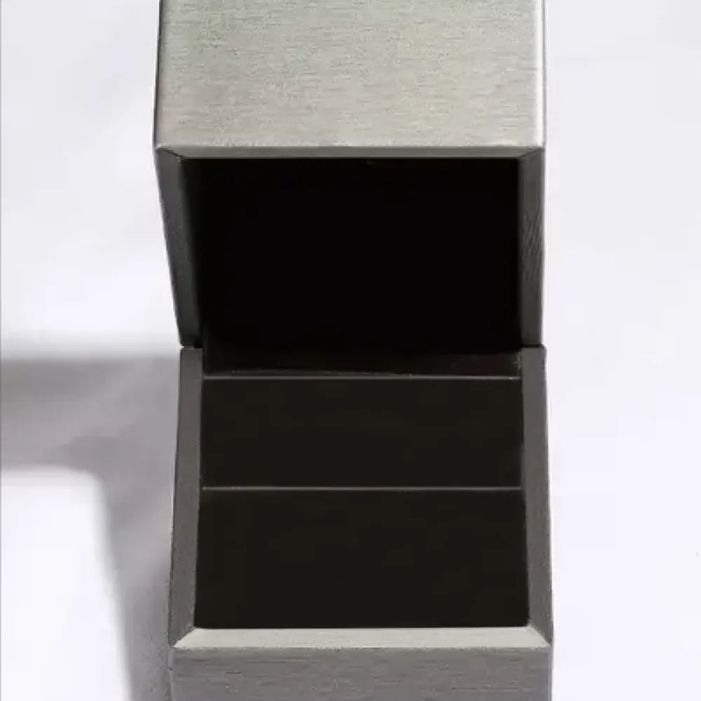 Brushed silver luxury ring box open for 925 sterling silver moissanite ring presentation by Varex HQ.