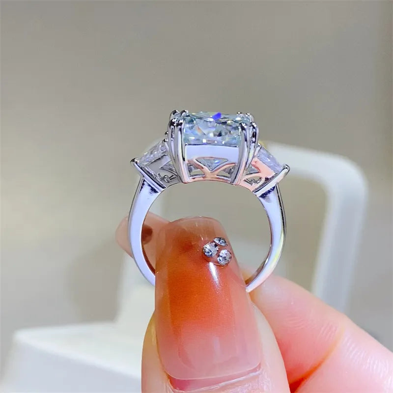 Side profile view showing secure multi-prong basket setting of 925 sterling silver moissanite ring.