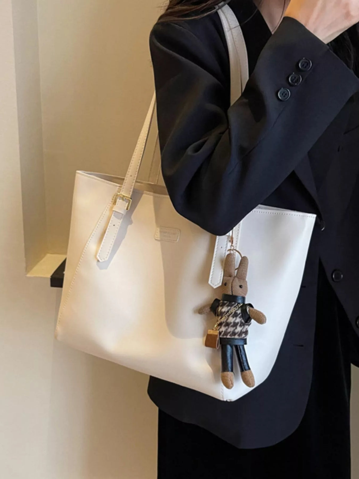 Slouchy vegan leather tote bag - lifestyle shot worn on the shoulder